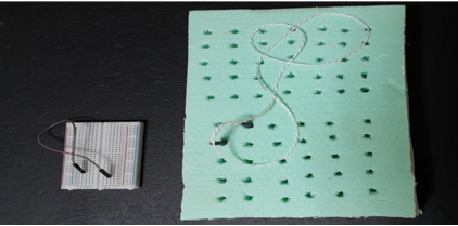 On left, a circuit board to with parts connected by a wire on the surface. On right, a larger veersion of circuit board.