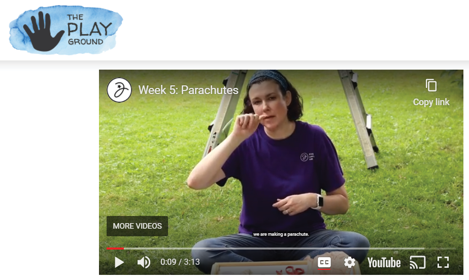 A screenshot of a YouTube video with a person signing.